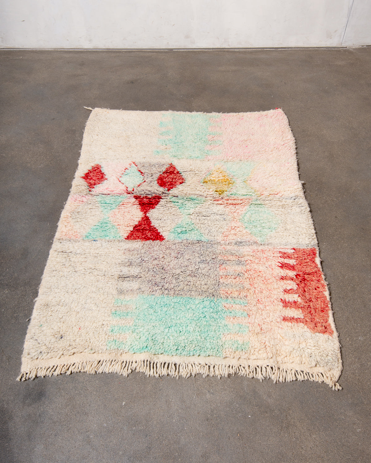Modern, designer, handcrafted Berber rug from Morocco. Vintage carpet with beautiful colours and patterns and fluffy texture.